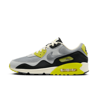 Sideview van de Nike Air Max 90 SP Patta Waves Cyber met felgele mudguard, golvend leren paneel en witte zool
