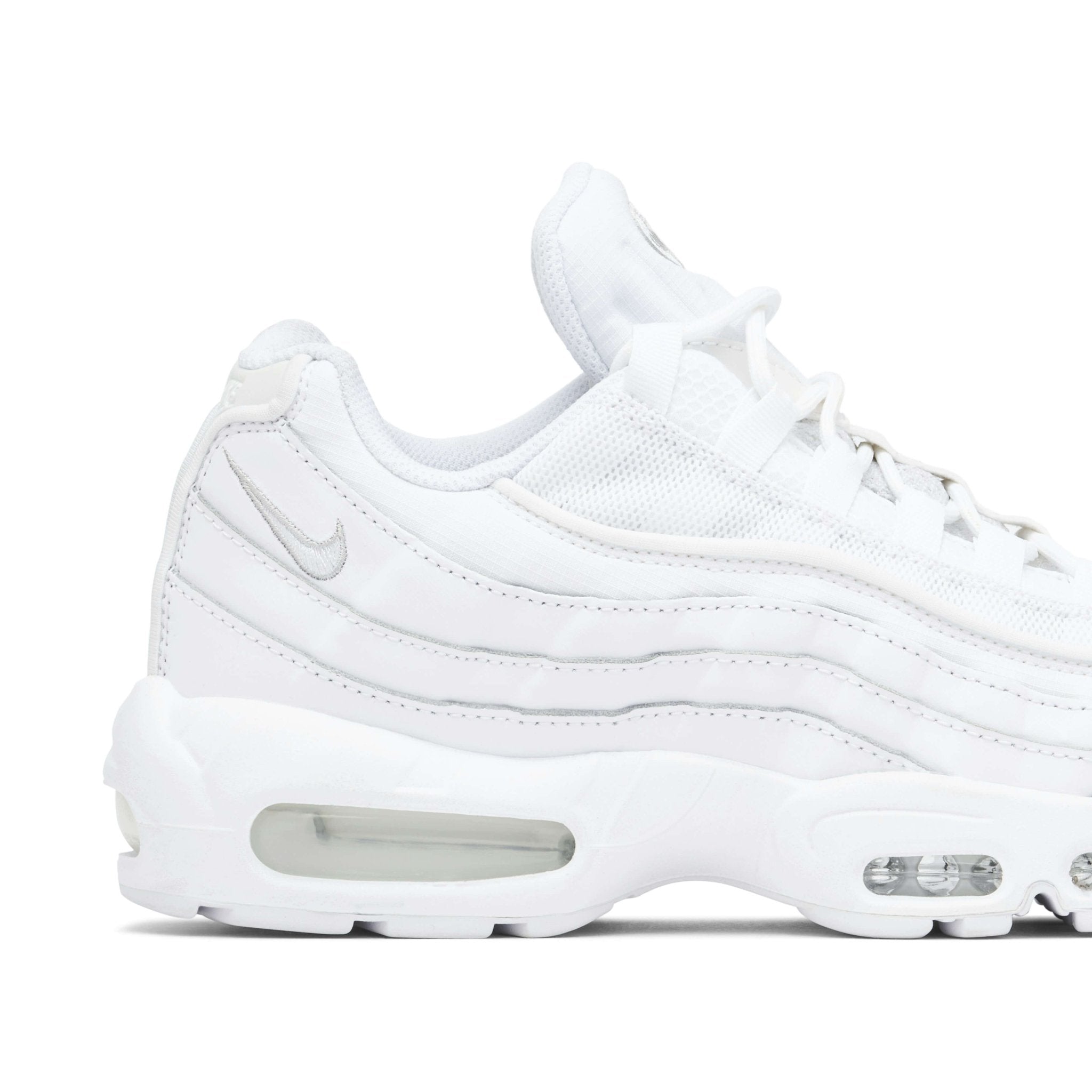 Rubberen buitenzool met flexgroeven van de Nike Air Max 95 Essential White/Grey Fog Sneaker voor grip en stabiliteit.