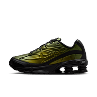 Nike Shox Ride 2 Black Cargo Khaki zijaanzicht met zwart mesh bovenwerk, khaki overlays en iconische Shox-demping in de hak