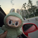 Pop Mart Labubu Tasty Macarons Green Grape – display met meerdere pendants in zachte groen-tinten, compleet pastelpresentatie