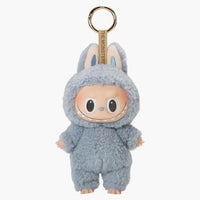 Pop Mart Labubu Tasty Macarons Sea Salt Coconut – sealed vinyl plush pendant met pastelblauwe kokosnoot-gloed en Labubu gezicht