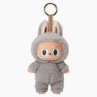 Pop Mart Labubu Tasty Macarons Sesame Bean – sealed pendant met pastel sesame look, herkenbare Labubu-glimlach en grijsbruine pluche afwerking